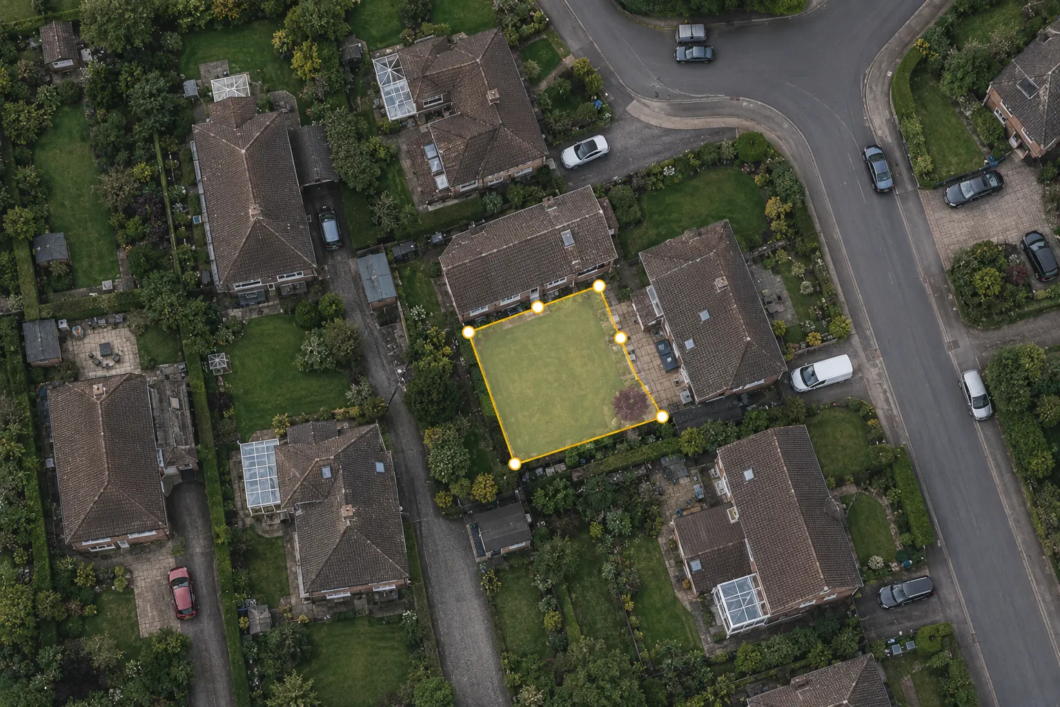 Aerial view of a home with its lawn boundary drawn